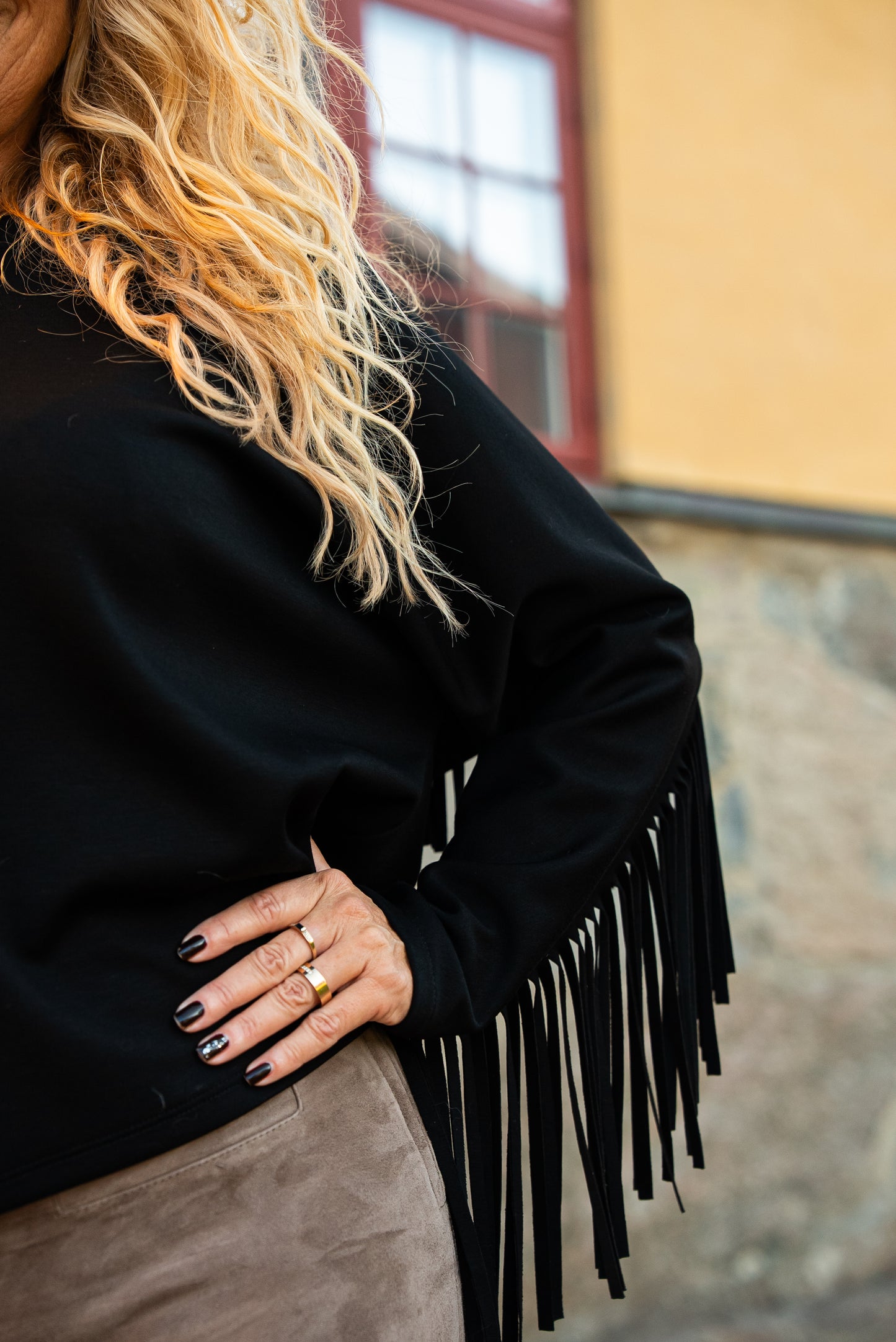 Fringes on back and sleeves